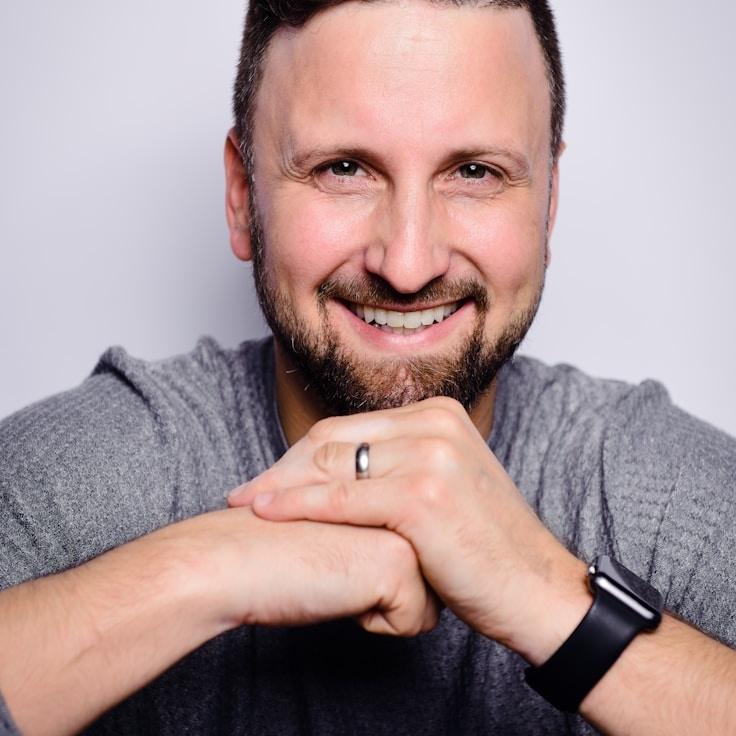 Milan Kapoor, Client Relations Director, discussing corporate gifting strategy with business clients